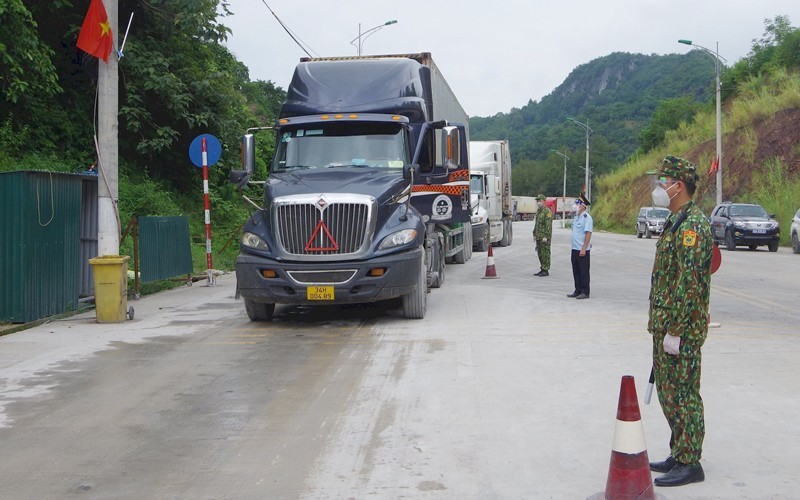 Lorries carrying agricultural goods at Tan Thanh Border Gate in Lang Son Province.