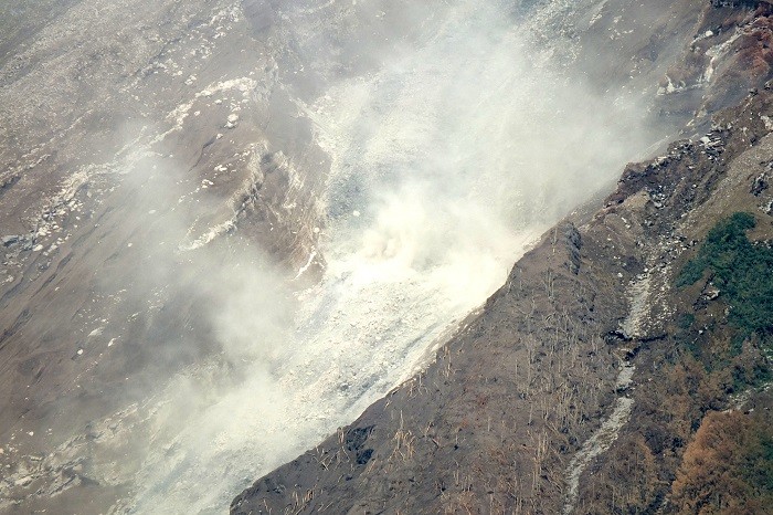 Hot ash is seen from the Mount Semeru Volcano during an eruption from Candipuro district in Lumajang, East Java province, Indonesia, December 18, 2021, in this photo taken by Antara Foto.