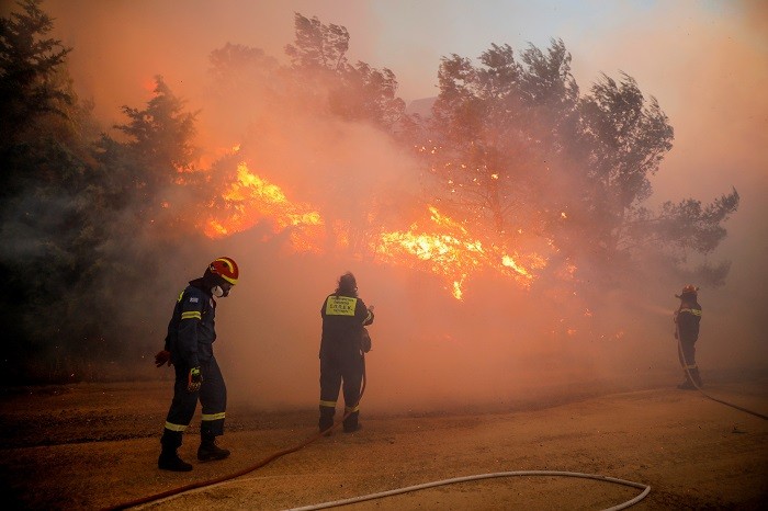 Greek authorities on Sunday ordered the evacuation of more than 30,000 residents of Marathon town, northeastern Attica region, due to a fast-moving wildfire outside Athens fuelled by hot and windy weather.