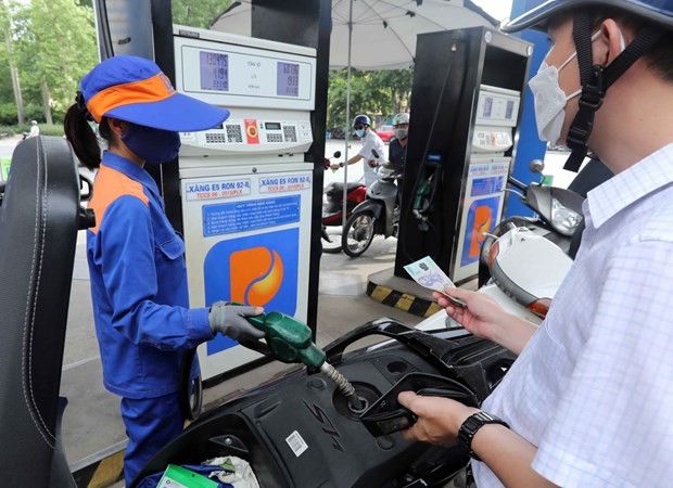 At a filling station in Hanoi. (Photo: VNA)