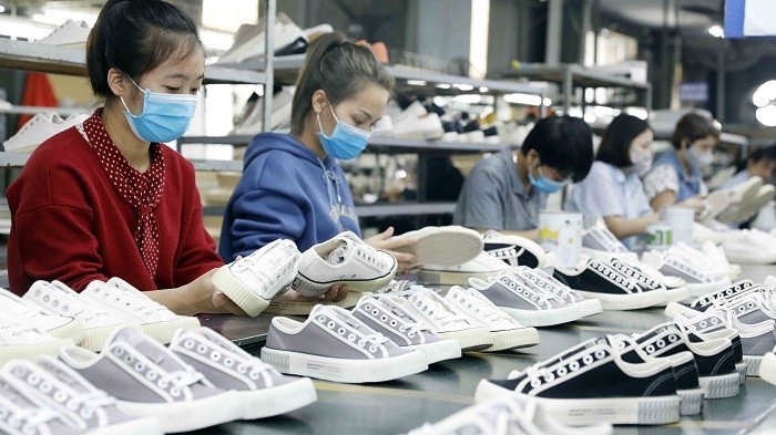 Workers at a Ha Tay Chemical Weave Co., Ltd in Hanoi. (Photo: VNA) 