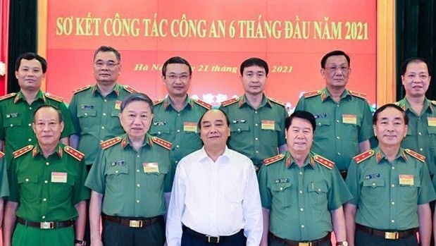 State President Nguyen Xuan Phuc (middle, front row) at the event (Photo: VNA)