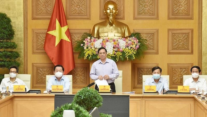 Prime Minister Pham Minh Chinh at a meeting with representatives from press agencies (Photo: Tran Hai)