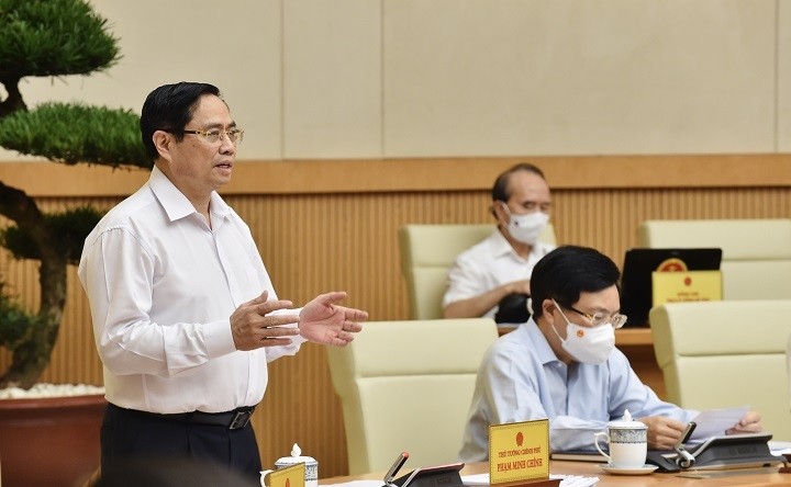 Prime Minister Pham Minh Chinh speaks at the regular cabinet meeting on July 1. (Photo: VGP)