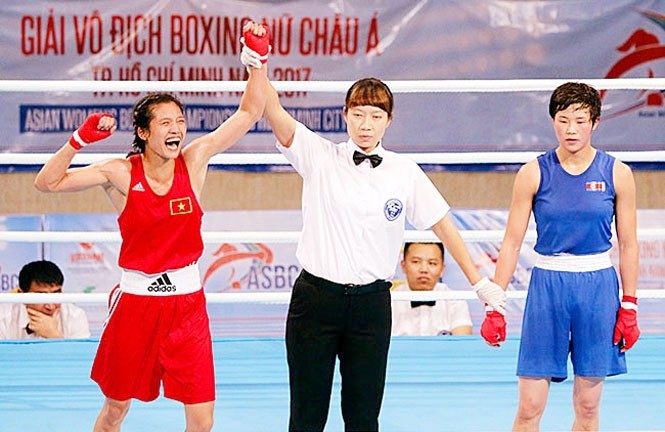 Nguyen Thi Tam (L) is the second Vietnamese boxer eligible for the 2020 Tokyo Olympics. 