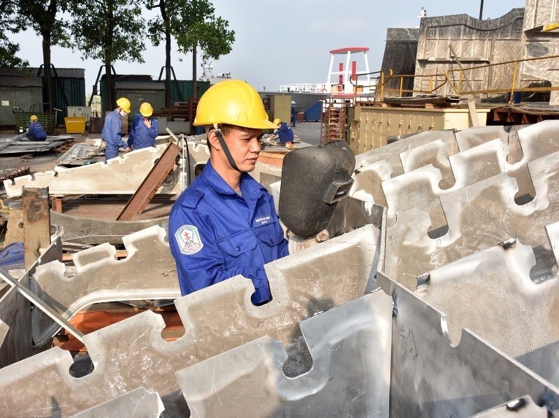 Workers at Hong Ha Shipbuilding company produce shipbuilding components.