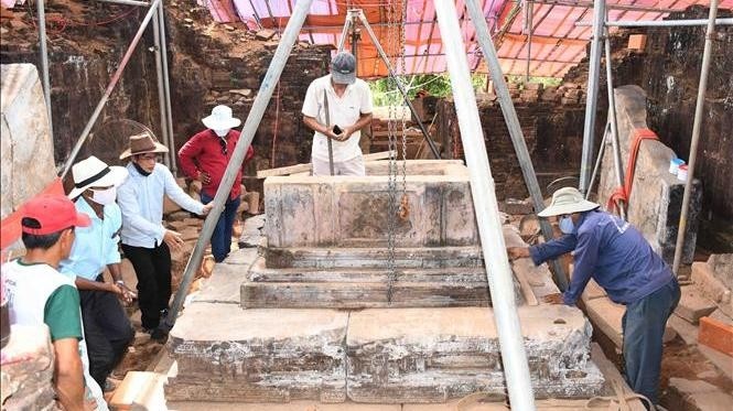 Vietnamese and Indian experts are working to repair damaged structures at the My Son Sanctuary. (Photo: VNA)