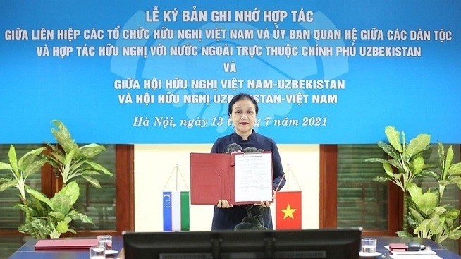 VUFO President Nguyen Phuong Nga at the signing ceremony  (Photo: baoquocte.vn)