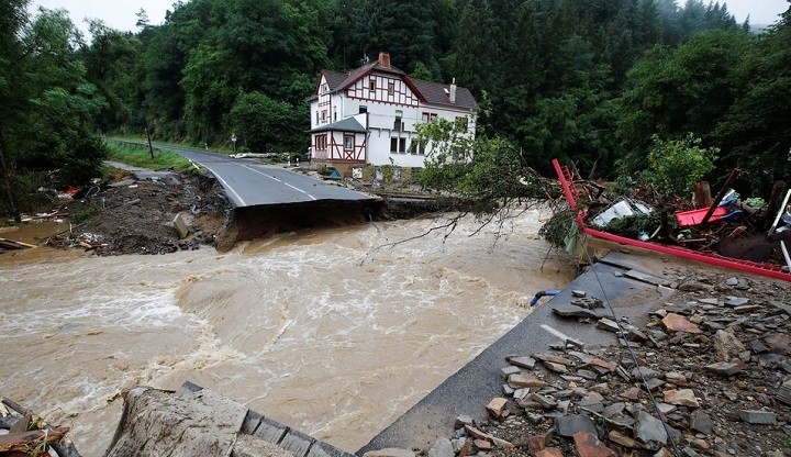 A destroyed road next to the Ahr river is seen on a flood-affected area following heavy rainfalls in Schuld, Germany, on July 15, 2021. (Photo: Reuters)