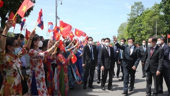 Lao Party General Secretary and State President Thongloun Sisoulith welcomed in Hanoi during his official friendship visit to Vietnam in late June 2021. (Photo: VNA)