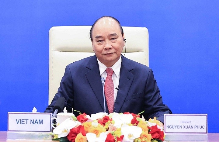 President Nguyen Xuan Phuc shares Vietnam's efforts in implementing the dual goal on pandemic fight and economic growth maintenance. (Photo: VGP)