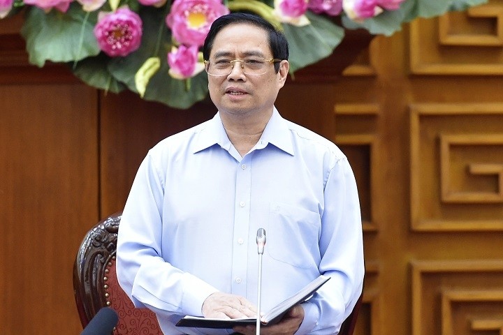 Prime Minister Pham Minh Chinh speaks at the meeting. (Photo: VGP)