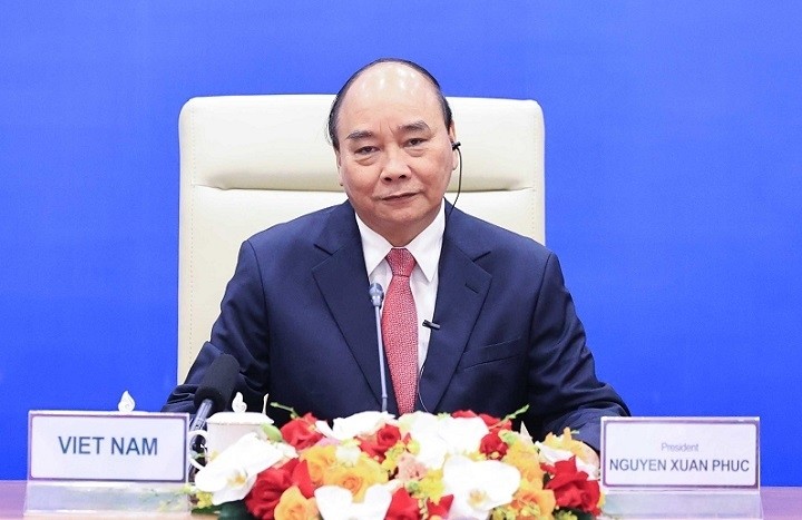 President Nguyen Xuan Phuc shares Vietnam's efforts in implementing the dual goal of pandemic fighting and economic growth maintenance. (Photo: VGP)