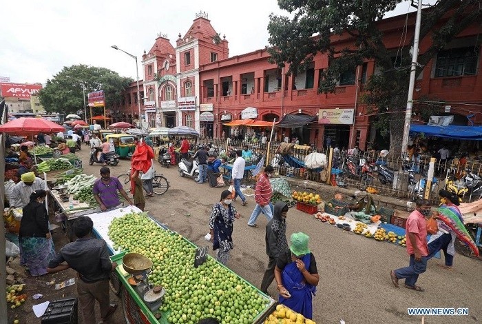 Vendors resume business as the COVID-19 restrictions ease at one of the oldest market in Bangalore, India, July 16, 2021. (Str/Xinhua)