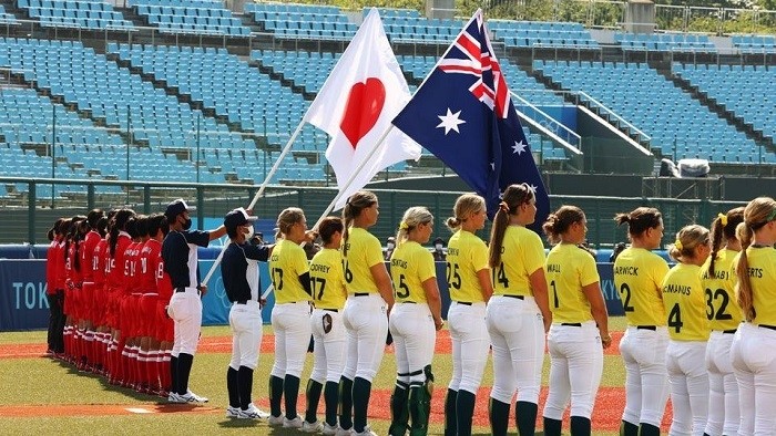Tokyo 2020 Olympics - Softball - Women - Opening Round - Australia v Japan - Fukushima Azuma Baseball Stadium - Fukushima, Japan - July 21, 2021. Players during national anthems. (Photo: Reuters)