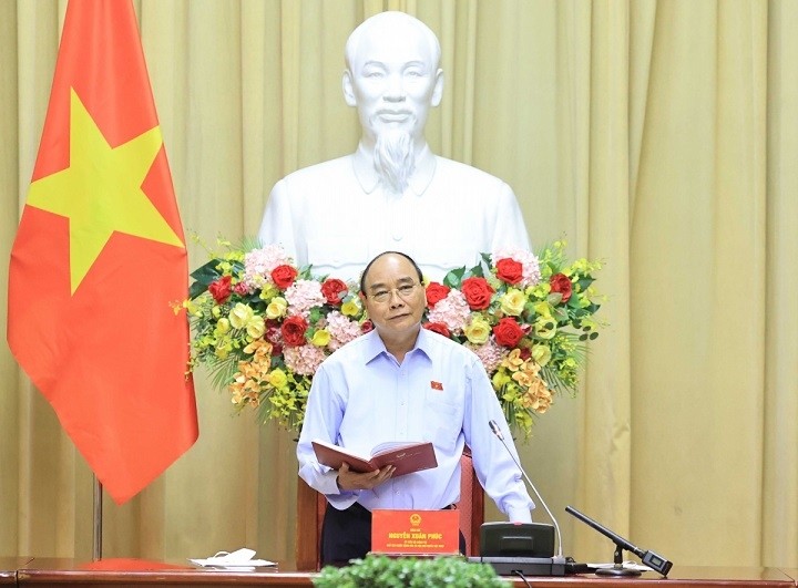 President Nguyen Xuan Phuc speaks at the meeting. (Photo: VGP)