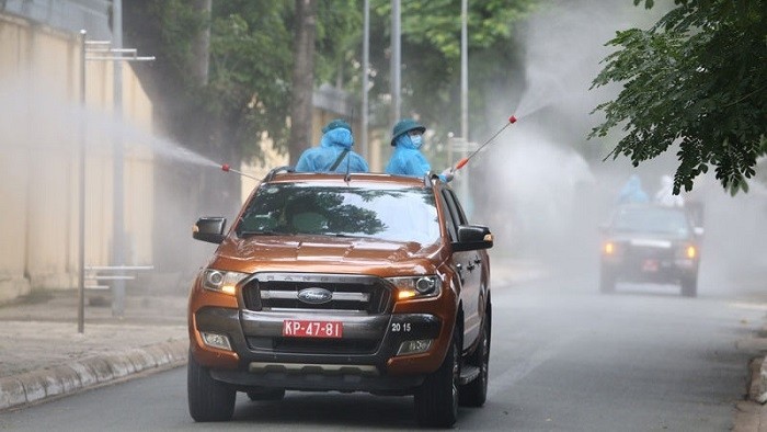Ho Chi Minh City starts a seven-day campaign to disinfect the whole city on July 23, 2021, aimed at improving the effectiveness of COVID-19 prevention and control measures. (Photo: NDO/Quang Quy)