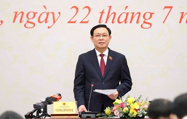 NA Chairman Vuong Dinh Hue speaks at the press conference in Hanoi on July 22. (Photo: VNA)