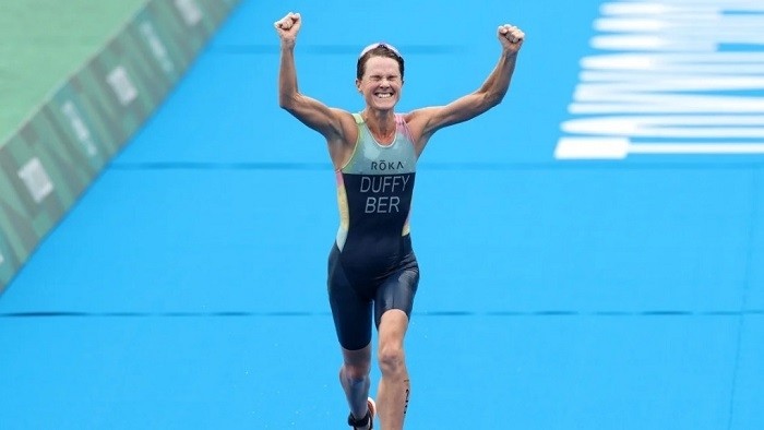 Flora Duffy of Team Bermuda celebrates winning the gold medal during the Women's Individual Triathlon on day four of the Tokyo 2020 Olympic Games at Odaiba Marine Park in Tokyo, Japan, July 27, 2021. (Photo: Getty Images)