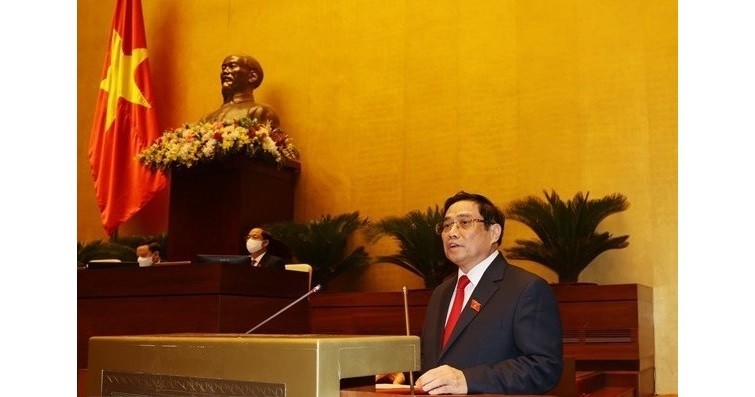 Prime Minister Pham Minh Chinh speaks at the session. (Photo: VNA)