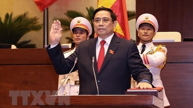 Prime Minister Pham Minh Chinh swears in on July 26. (Photo: VNA)
