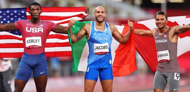 Italy's Marcell Jacobs (C) celebrates winning the men’s 100m title at Tokyo 2020. (Photo: Getty Images)