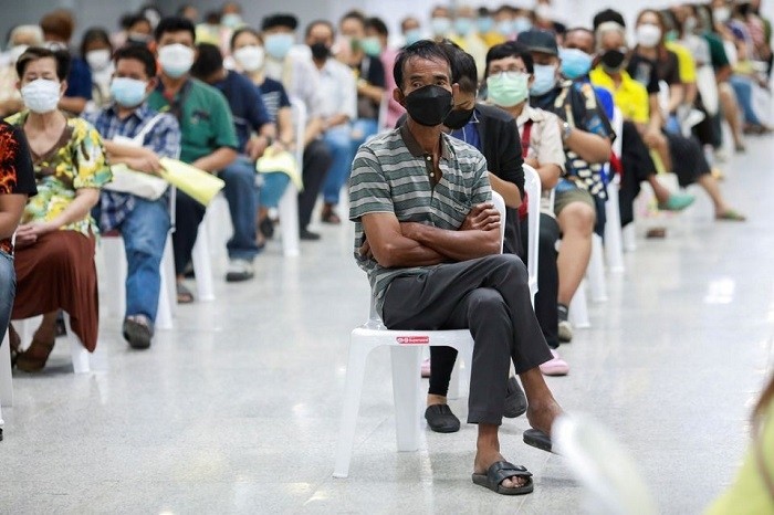 People queue at the Central Vaccination Center as Thailand begins offering first doses of the AstraZeneca vaccine to at-risk groups amid the coronavirus (COVID-19) outbreak in Bangkok, Thailand, July 26, 2021. (Photo: Reuters)