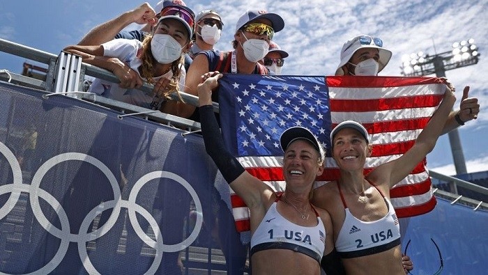 Tokyo 2020 Olympics - Beach Volleyball - Women - Gold medal match - Australia (Artacho del Solar/Clancy) v United States (April/Alix) - Shiokaze Park, Tokyo, Japan - August 6, 2021. April Ross of the United States and Alix Klineman of the United States celebrate winning gold medal match against Australia. (Photo: Reuters)