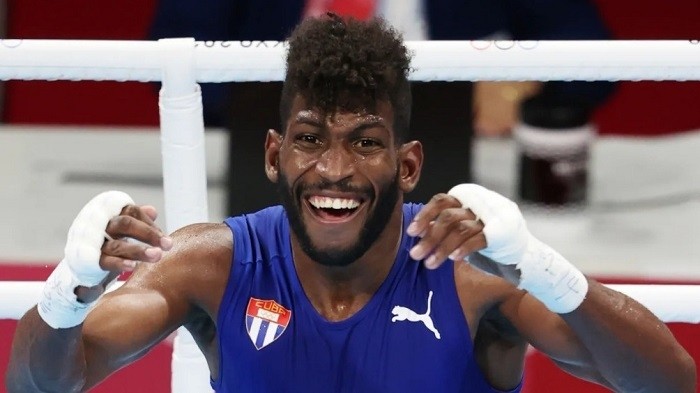 Andy Cruz of Team Cuba celebrates victory and winning a gold medal during the Men's Light (57-63kg) Final bout between Keyshawn Davis of Team United States and Andy Cruz of Team Cuba on day sixteen of the Tokyo 2020 Olympic games at Kokugikan Arena in Tokyo, Japan on August 8, 2021. (Photo: Getty Images)