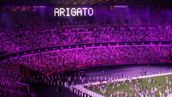 The word "arigato", meaning "thank you" in Japanese, is seen at the end of the Tokyo 2020 Olympics closing ceremony. (Photo: Reuters)