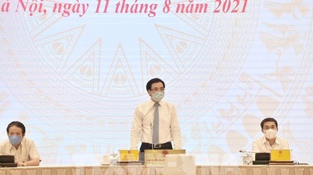 Minister-Chairman of the Government Office Tran Van Son speaks at the Government press conference (Photo: VNA)