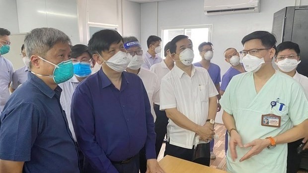 Health Minister Nguyen Thanh Long at the COVID-19 treatment hospital No.13 (Photo: VNA)