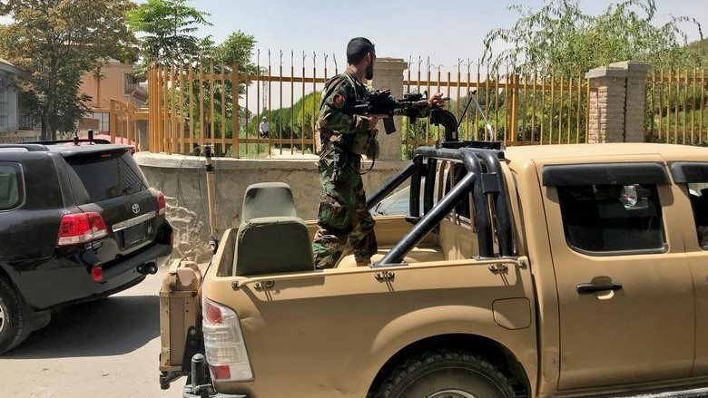 An Afghan soldier stands in a military vehicle on a street in Kabul, Afghanistan, August 15, 2021. (Photo: Reuters)