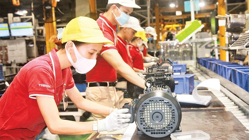 The manufacturing of electric motors at Toshiba Industrial Products Asia Co., Ltd at Amata Industrial Park in Dong Nai province. (Photo: THIEN VUONG)