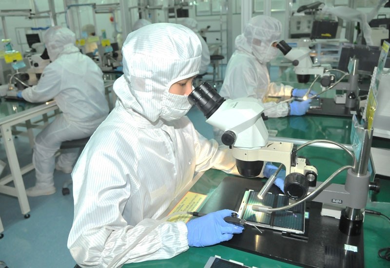 The production of semiconductor components at MTEX Vietnam in Tan Thuan Export Processing Zone.