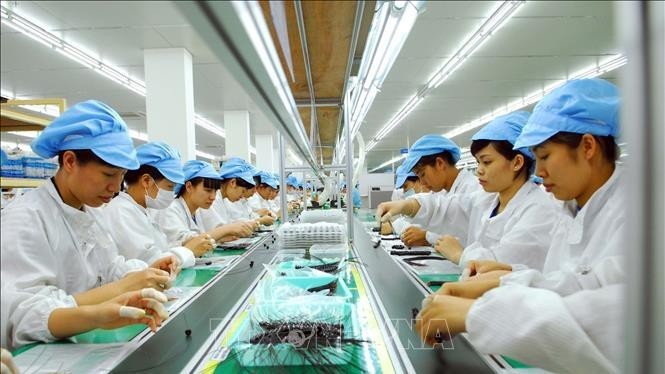 An electronic equipment production line at Bluecom Vina Co., Ltd in Trang Due Industrial Park, Hai Phong. (Photo: VNA)