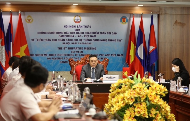 State Auditor General of Vietnam Tran Sy Thanh speaks at the videoconference. (Photo: laodong.vn)