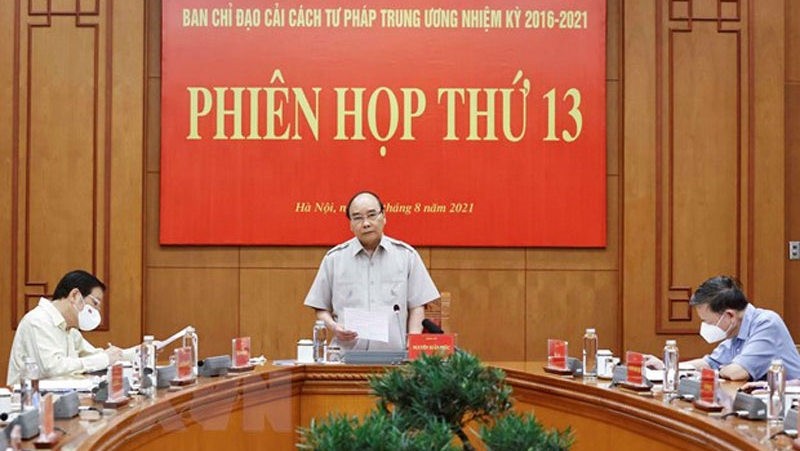 President Nguyen Xuan Phuc speaking at the meeting. (Photo: VNA)