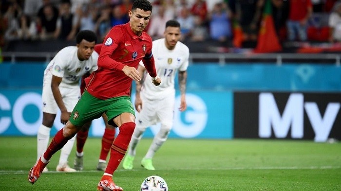Football - Euro 2020 - Group F - Portugal v France - Puskas Arena, Budapest, Hungary - June 23, 2021, Portugal's Cristiano Ronaldo scores their second goal from the penalty spot. (Photo: Pool via Reuters)