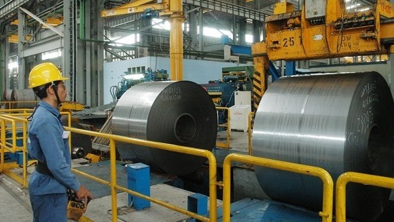 The production of rolled steel soars by 48.3% over the same period last year. (Illustrative image/CAO THANG)