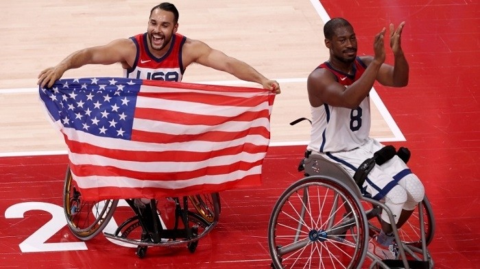 Jorge Sanchez #1 and Brian Bell #8 of Team United States celebrate after defeating Team Japan during the men's Wheelchair Basketball gold medal game on day 12 of the Tokyo 2020 Paralympic Games at Ariake Arena in Tokyo, Japan on September 05, 2021. (Photo: Getty Images)