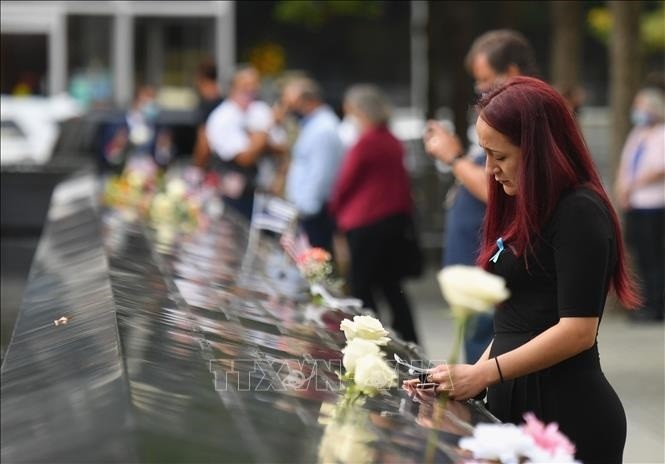 The pain of 9/11 has always accompanied the heroism and resilience of New Yorkers in particular and Americans in general. (Photo: AFP/VNA)