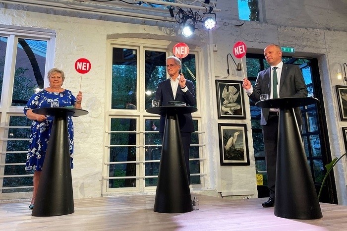 The three candidates for Norway's prime minister Erna Solberg from the Conservatives, Jonas Gahr Stoere from Labour Party and Trygve Slagsvold Vedum from the Centre Party attend a debate in central Oslo, Norway August 9, 2021. Picture taken August 9, 2021. (Photo: Reuters)