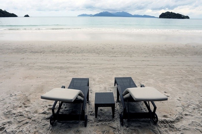 Empty chairs are seen at The Datai Langkawi resort beach, as Langkawi gets ready to open to domestic tourists from September 16, amid the coronavirus disease (COVID-19) outbreak, Malaysia September 14, 2021. (Photo: Reuters)  