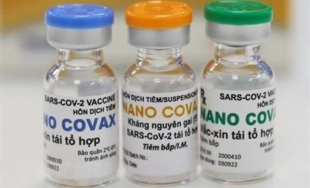 Deputy Prime Minister Vu Duc Dam has asked for completion of the dossier of the homegrown Nano Covax vaccine. (Photo: VNA)