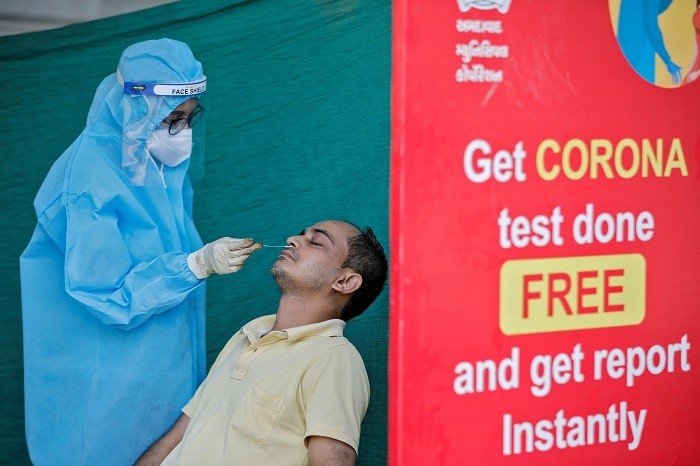 India conducted the lowest number of daily COVID-19 tests since mid-August on Sunday, but the health ministry urged local governments not to let their guard down during the September to November festival season.