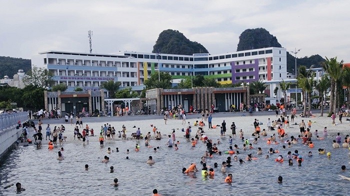 People swim at Hon Gai Beach in Ha Long, Quang Ninh Province.