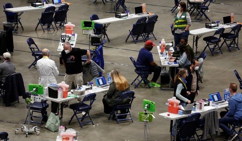 People receive their COVID-19 vaccines at a mass vaccination site at Lumen Field Event Center in Seattle, Washington, U.S. March 13, 2021. (Photo: Reuters)