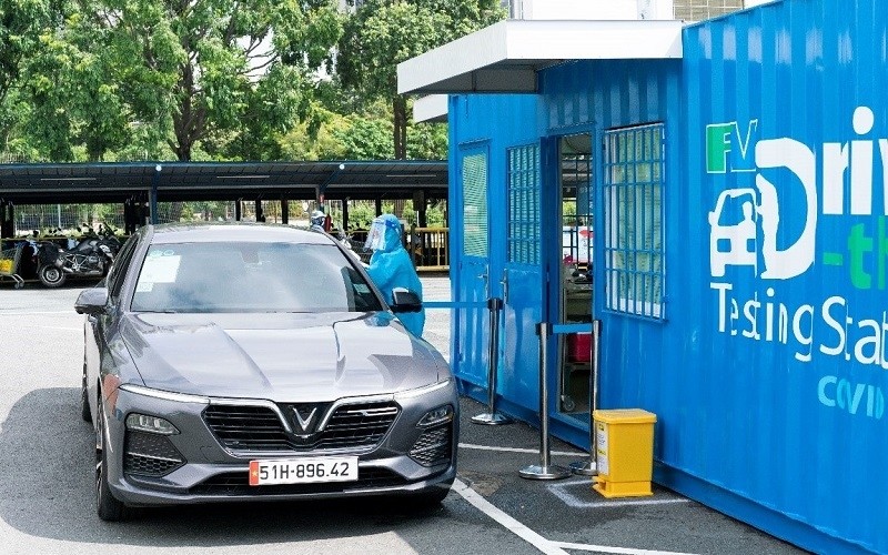 The drive-through COVID-19 testing station at Mega Mall in Ho Chi Minh City