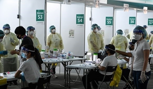 A COVID-19 testing site in Singapore. (Photo: AFP/VNA)